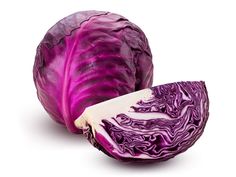 red cabbage cut in half on white background