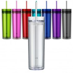 the tumbler cup is filled with different colored drinks