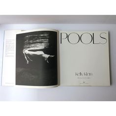 an open book with black and white images on the cover, titled pool's