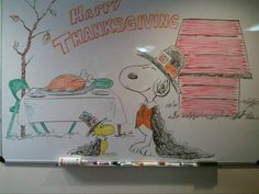 a drawing of a thanksgiving dinner with a dog