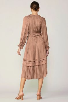 This long-sleeve midi dress exudes romantic charm with its tied neckline, sweet ruffle accents, and softly crinkled pleats. The look is polished, the feel is relaxed—perfect for date night or daily wear. Split neckline with self-tie Long sleeves Elasticized waist Ruffle trim Irregular pleating DIMENSIONS •Standard: 47.5" L Curvy Date Night Outfit, Air Clothes, Valentines Day Dresses, Dress Dusty, Valentine's Day Outfit, Curvy Dress, Pleated Midi Dress, Tennis Clothes, Long Sleeve Midi