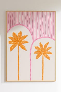 a painting with palm trees on it hanging on the wall