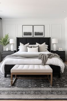 a large bed sitting in the middle of a bedroom