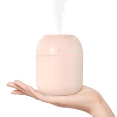 PRICES MAY VARY. 𝐏𝐨𝐫𝐭𝐚𝐛𝐥𝐞 & 𝐂𝐨𝐦𝐩𝐚𝐜𝐭: Take this mini humidifier anywhere – perfect for bedrooms, offices, and cars. Its soothing night light feature adds a peaceful ambiance, enhancing your sleep quality.（No Adapter） 𝐔𝐥𝐭𝐫𝐚-𝐐𝐮𝐢𝐞𝐭 𝐎𝐩𝐞𝐫𝐚𝐭𝐢𝐨𝐧: With a whisper-quiet 20dB noise level, this small humidifier ensures a tranquil environment for sleeping or working. Choose between continuous or intermittent mist modes to suit your needs. 𝐄𝐚𝐬𝐲 𝐎𝐧𝐞-𝐓𝐨𝐮𝐜𝐡 𝐂𝐨𝐧𝐭𝐫 Pink Humidifier, Small Humidifier, Mini Humidifier, Portable Humidifier, Light Feature, Room Stuff, Noise Levels, Car Office, Color Changing Lights