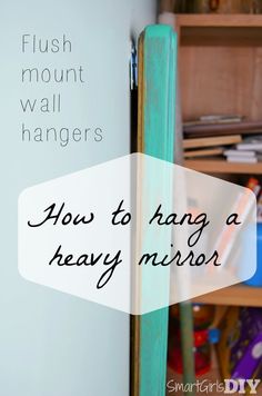 a close up of a refrigerator with the words how to hang a heavy mirror