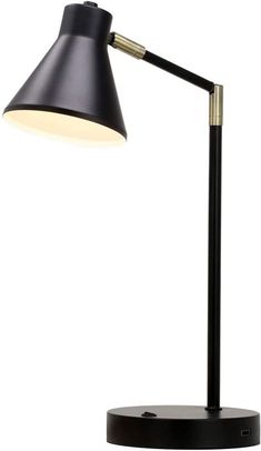 a black desk lamp on a white background