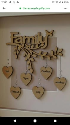 a family tree with hearts hanging from it