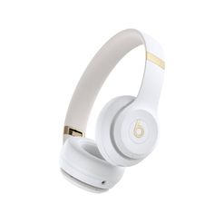 the beats on ear headphones are white and gold