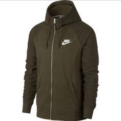 Nike Casual Fleece Track Jacket, Casual Nike Fleece Track Jacket, Sporty Half-zip Sweater For Streetwear, Nike Green Athleisure Hoodie, Winter Sportswear Half-zip Sweatshirt, Casual Fleece Hooded Jacket For Sports, Winter Half-zip Sportswear Sweatshirt, Nike Casual Track Jacket For Gym, Nike Casual Track Jacket With Drawstring Hood