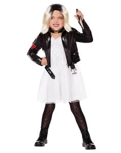 Your toddler will look terrifyingly cute on Halloween night when they suit up as Tiffany, the Bride of Chucky! This officially licensed costume includes a white dress, a faux leather black jacket, a wig, and a choker necklace that reads "Tiff." Your little one will look so adorable, it's scary! Officially licensed Includes: Dress Jacket Wig Necklace Long sleeves Zipper closure Material: Polyurethane, polyester Care: Spot clean Imported Note: Prop sold separately The Bride Of Chucky, Chucky Outfit, Chucky And Tiffany Costume, Tiffany Costume, Home Halloween Costumes, Toddler Costumes Girl, Leather Black Jacket, Kids Costumes Girls, Horror Costume