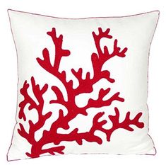 a red coral pillow on a white background