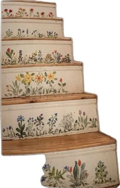 an old set of stairs painted with flowers