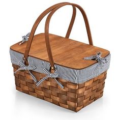 a wooden basket with blue and white striped fabric on the handle, isolated on a white background