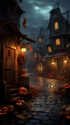 an image of a halloween scene with pumpkins on the ground and houses in the background