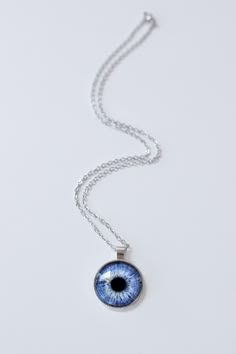 Buy one, get the second free!Snap a few pictures of your eye with your phone, and we’ll do the rest. Our experts will edit, print, and ship your personalized Iris Necklace. Each piece showcases your unique eyes, making it a one-of-a-kind gift and a great conversation starter.Please upload your desired eye photo for printing. Eye Locket Necklaces, Eye Pendant Necklace, Lover's Eye Necklace, Eye Necklace Realistic, Iris Necklace, Blue Evil Eye Metal Necklace, Photos Of Eyes, Resin Jewelry Diy, Personalized Artwork