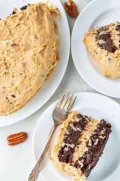 two white plates with cake on them and the words keto german chocolate cake