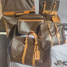 This Louis Vuitton Lot/Set Bundle Is The Perfect Travel Companion. Made With Durable Canvas And Featuring A Classic Brown Design With The Iconic Louis Vuitton Pattern, This Unisex Carry-On Bags And Luggage Is Perfect For Any Jet-Setter. What's Included In The Lot Is Louis Vuitton Keepall 45, Reporter Gm, Bucket Bag And Garment Bag And Porte Document Briefcase And Three Locks And Three Keys. First The Bucket Bag Has Some Wear On Top Corners Of The Canvas Please See Photos Does Not Affect The Bag Comes With Small Change Purse It Has The Louis Vuitton Made By The French Company In The Usa No Date Code Due To Age Next The Garment Bag Leather Has Darken Due To Age And Dose Not Affect The Bag It D Louis Vuitton Pattern, Louis Vuitton Keepall 45, Keepall 45, Brown Design, Louis Vuitton Keepall, Classic Brown, Jet Setter, Garment Bag, Change Purse