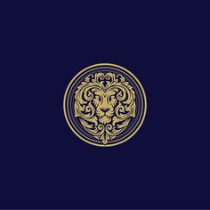 a lion's head in a circle on a dark blue background