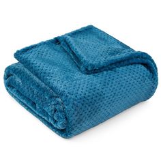 a blue blanket folded on top of each other