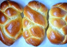 four loaves of bread sitting next to each other