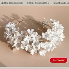 🥰 The bridal crown is handcrafted from air-dry clay, combined with high-end jewelry accessories, offering a unique and luxurious beauty for the wedding day. The air-dry clay is meticulously shaped to create delicate, soft details like flowers and leaves, reflecting the essence of fine craftsmanship. The sparkling jewelry accessories are skillfully attached, creating a perfect blend of natural beauty and glamour. 🥰 Each crown is not only an ideal accessory for the bride but also a work of art, adding charm and making her hairstyle stand out on this special day. ⭐️ Materials: Handcrafted clay flowers, jewelry wire, metal headband, white ribbon. ⭐️ Note  Each flower is unique as it is handcrafted with care. Therefore, the final product may slightly differ in color and shape from the sample Wedding Flower Headpiece, Hair Accessories White, Crown Bridal Hair, Flower Headpiece Wedding, Sparkling Jewelry, Pearl Headpiece, Floral Headband, Flower Headpiece, Metal Headbands