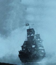 an old pirate ship in the ocean on a stormy day with waves crashing around it