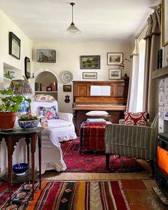 a living room filled with furniture and a piano