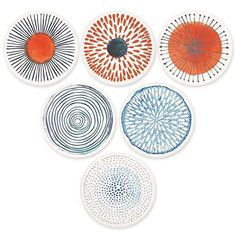 six plates with different designs on them