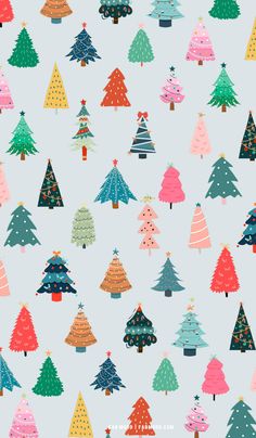 colorful christmas trees on a blue background