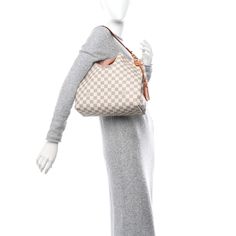 This is an authentic LOUIS VUITTON Damier Azur Graceful PM Rose Ballerine. This stylish shoulder bag is finely crafted of Louis Vuitton's signature Damier coated canvas in blue and white. The bag features a flat vachetta leather shoulder strap with polished gold hardware, a matching luggage tag, and a magnetic closure. This opens the bag to a spacious light pink fabric interior with a zipper pocket. Light Pink Fabric, Louis Vuitton Totes, Louis Vuitton Empreinte, Louis Vuitton Damier Azur, Stylish Shoulder Bag, Louis Vuitton Damier Ebene, Louis Vuitton Shoulder Bag, Luggage Tag, Pink Fabric