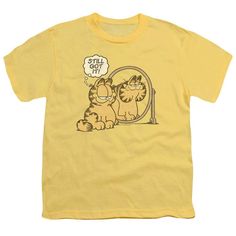 Officially Licensed Merchandise. Printed in the U.S.A. 100% Cotton Tee. Design Will Not Fade, Crack or Peel After Multiple Washes. State of the Art Digitally Printed Clothing. Made to Order. Takes 2-5 Business Days to Make to Perfection. Garfield T Shirt, Vintage Cartoon Print Crew Neck T-shirt, Yellow Crew Neck T-shirt With Cartoon Print, Garfield Shirt Vintage, Affordable Yellow 90s T-shirt, Cartoon Cat, 50 Fashion, State Art, Be Still