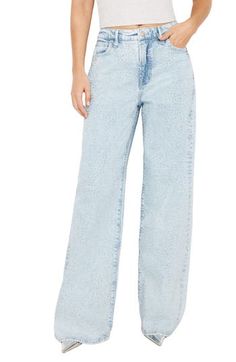 Glistening crystal embellishments dance in the light on these low-stretch wide-leg jeans featuring a faded indigo wash. 33" inseam; 25" leg opening; 13" front rise; 15 1/2" back rise (size 8) Zip fly with button closure Five-pocket style 79% cotton, 20% recycled cotton, 1% elastane Machine wash, tumble dry Imported Black Owned/Founded Crystal Embellishment, Nordstrom Store, Good American, Anniversary Sale, Free Fabric, Recycled Cotton, Wide Leg Jeans, Bottoms Pants, Jeans Pants