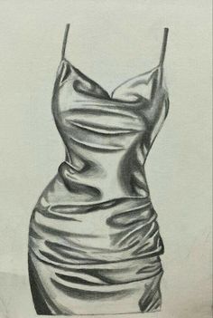 a pencil drawing of a dress on paper