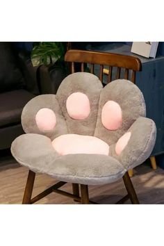 a chair that is shaped like a cat paw