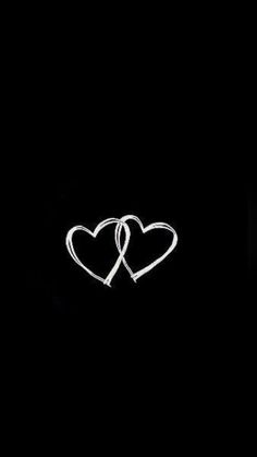 two hearts are drawn in the dark