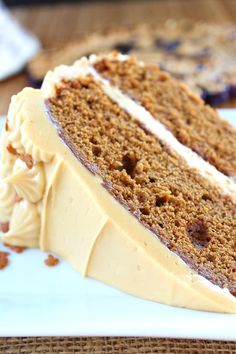 a slice of carrot cake on a white plate