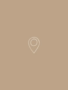 an image of a map pin in the middle of a brown background with white lines