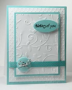 a handmade card with the words thinking of you written on it and a bow