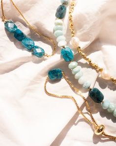 Our Saylor Pearl Bracelet is absolutely eye-catching! What do we love about it? The stunning gold beads mixed with the natural pearls make for a beautiful piece to stack with your other bracelets. Pull Bracelet, Pearl Bracelet Gold, Apatite Stone, Gold Bead Bracelets, Freshwater Pearls Earrings, Blue Apatite, Pretty Earrings, Opal Necklace, Delicate Necklace