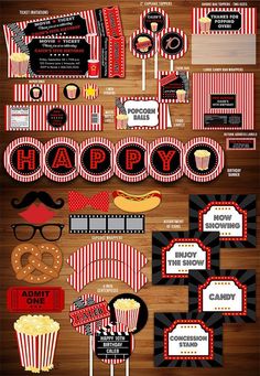 an assortment of red and black candy bar wrappers, cupcake toppers, and other items