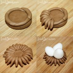 four different types of chocolate molds on a wooden table with eggs in the middle