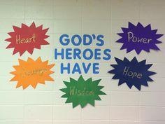 a bulletin board that says god's hero's have written on the wall