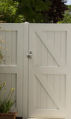 an image of a white wooden gate