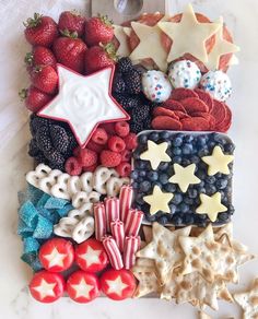 an american flag made out of cookies and berries