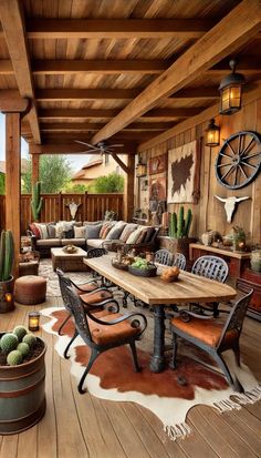 an outdoor living area with wooden flooring and cactus plants on the side of it