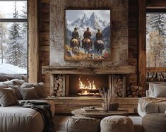 a living room filled with furniture and a fire place in front of a painting on the wall