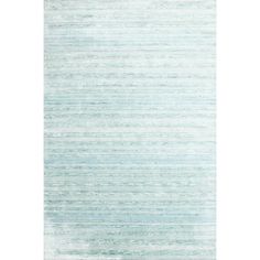 a light blue and white rug with vertical stripes