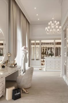 an elegant dressing room with chandelier, mirror and chair in white color scheme