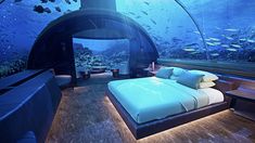 an underwater bedroom is shown in this image