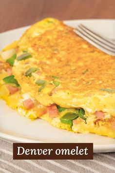 an omelet on a plate with a fork